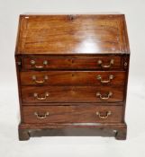 Georgian mahogany bureau, the fall-front having an assortment of drawers, pigeonholes and single