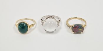 Lady's 9ct white gold dress ring set with cabochon claw set moonstone and white stones, a 9ct yellow