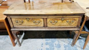 George III oak dresser base, the rectangular top over two deep cockbeaded frieze drawers having a