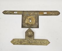 Brass door plate with embossed neoclassical decoration incorporating a key hole and a knob handle,