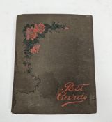 Postcard album containing approximately 120 mid-century postcards, mainly photographic seaside