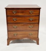 Reproduction mahogany veneer chest of four long drawers with brass handles, on bracket feet, 73cm