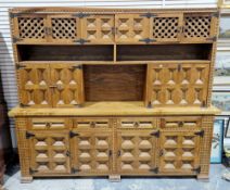 Mid-century Spanish cherrywood dresser with carved moulded geometric carving throughout and iron