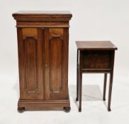 Mahogany cabinet with two moulded panel doors, on four bun feet, 83cm high x 45cm wide x 25cm