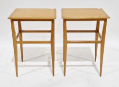Pair of mid-century pale oak side/lamp tables, the rectangular tops on square shaped legs united