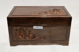 South East Asian camphorwood blanket chest, the top and front panel with relief carving of figures