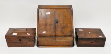 Victorian oak stationery cabinet, the sloping twin doors opening to a fitted interior, the hinged