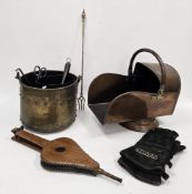 Collection of fireside items including a brass coal/log bucket with swing handle and studded detail,