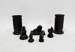 Four Burmese bronze opium weights in sizes, cast as birds and a dragon, a 19th century bronzed metal