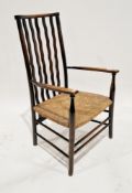 Arts & Crafts-style late 19th/early 20th century low chair with five section wavy line bar back