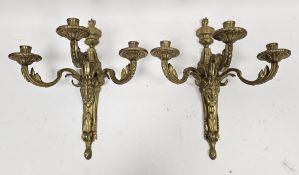 Pair of brass three branch wall lights, cast in the neoclassical manner, with foliate scroll