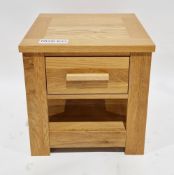 Modern pale oak side/lamp table of square form with single drawer, square legs and shelf below, 50cm