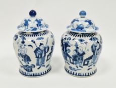 Pair Chinese porcelain blue and white inverse baluster vases and matched covers, 19th century,
