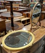 Early 20th century mahogany dressing table swing mirror of oval form, 46cm high and a modern oval