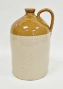 Stoneware flagon with impressed marks for J.T.Owen Wine & Spirit Merchant, Stroud, with loop strap