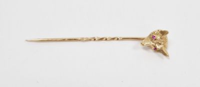 9ct gold and red stone fox stickpin, the fox mask set with two pink stones for eyes, probably