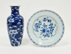 Chinese export porcelain blue and white soup plate, 18th century, painted with flowering shrubs