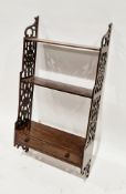 19th century rosewood hanging wall shelf, having three graduated shelves over a single drawer with