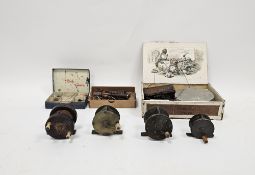 Collection of fishing equipment including two brass, one mahogany  and one alloy reels, all with