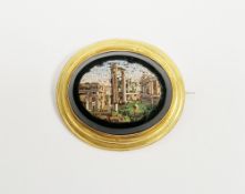 Grand Tour micro-mosaic brooch mounted in yellow metal oval depicting the Forum in Rome, 5cm wide (