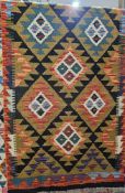 Maimana kilim midnight blue ground runner, with three rows of hooked lozenge and lozenge medallions,