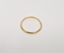 22ct gold fine wedding band, 1.3g approx.  Condition Report Ring size 'N'