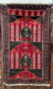 Afghan Baluch red ground wool prayer rug, decorated with geometric patterns within a border, 148cm x