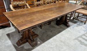 Mid-century Spanish cherrywood dining table, the rectangular top with ribbed carved edge, on two