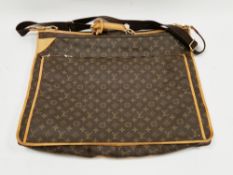 Louis Vuitton suit/garment bag, monogrammed with beige leather trim and gold tone hardware, with