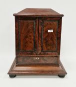 19th century mahogany table-top cabinet, the two moulded doors with beaded decoration, opening to