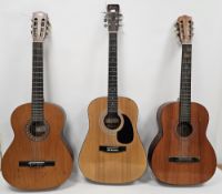 Three acoustic guitars including Encore model W250, Encore model RCG50N and a Tatra Classic (3)