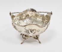 Early 20th century silver bonbon dish, Chester import marks for 1906, having foliate cast swing