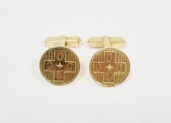 Pair millennium 18ct gold and diamond cufflinks, each circular with millennium mark set to the