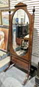 19th century rosewood and marquetry inlaid cheval mirror, with oval shaped plate, the frame with two