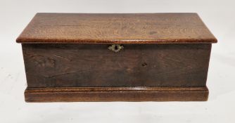 18th century oak blanket box having a hinged lid, shaped brass escutcheon, on plinth base, 34cm high