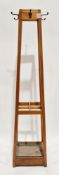 Early to mid-20th century teak square coat and stickstand of square tapered form, having four