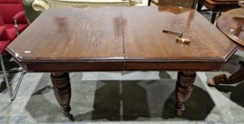 Victorian oak wind-out dining room table, the rectangular top with thumb moulded edge and canted