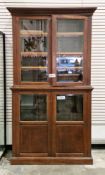 19th century mahogany library bookcase, the upper section with dentil moulded cornice over two bevel