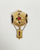 Gilt-metal stone set brooch, engraved strapwork design set with multiple coloured stones and with