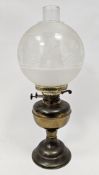 Late 19th / early 20th century brass oil lamp, the part opaque globular shade with raised moulded