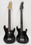 Two Encore electric guitars with black bodies