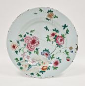 Chinese export famille rose charger, 18th century, painted with a peony and other flowers amongst