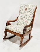 19th century mahogany open frame rocking chair, with upholstered back and seat, scrolling carved