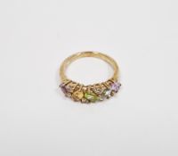 9ct yellow gold multi-gemstone ring, comprising a row of faceted oval claw-set gemstones including