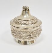 Indian white metal lidded bowl, of round form,  the domed lid with an elephant finial, the body with