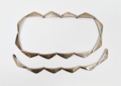 Danish sterling silver necklace and bracelet set designed by Hans Hansen, being part of the