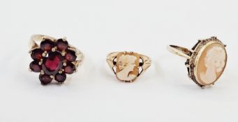 9ct gold small cameo ring, a silver cameo ring and a silver and garnet ring (3)