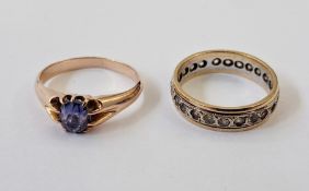 Gold coloured metal and blue stone ring and a ring 9ct gold and white stone eternity ring, gross
