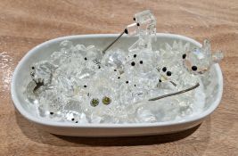 Collection of Swarovski crystal animals including a teddy bear, hedgehog, dog, birds, swan,