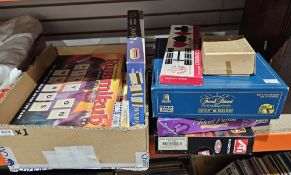 Assorted games including Trivial Pursuit Genius III edition, Rummikub game, Jarnac! and other